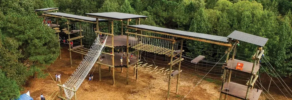 An aerial view of a high ropes course near the typhoon coast.